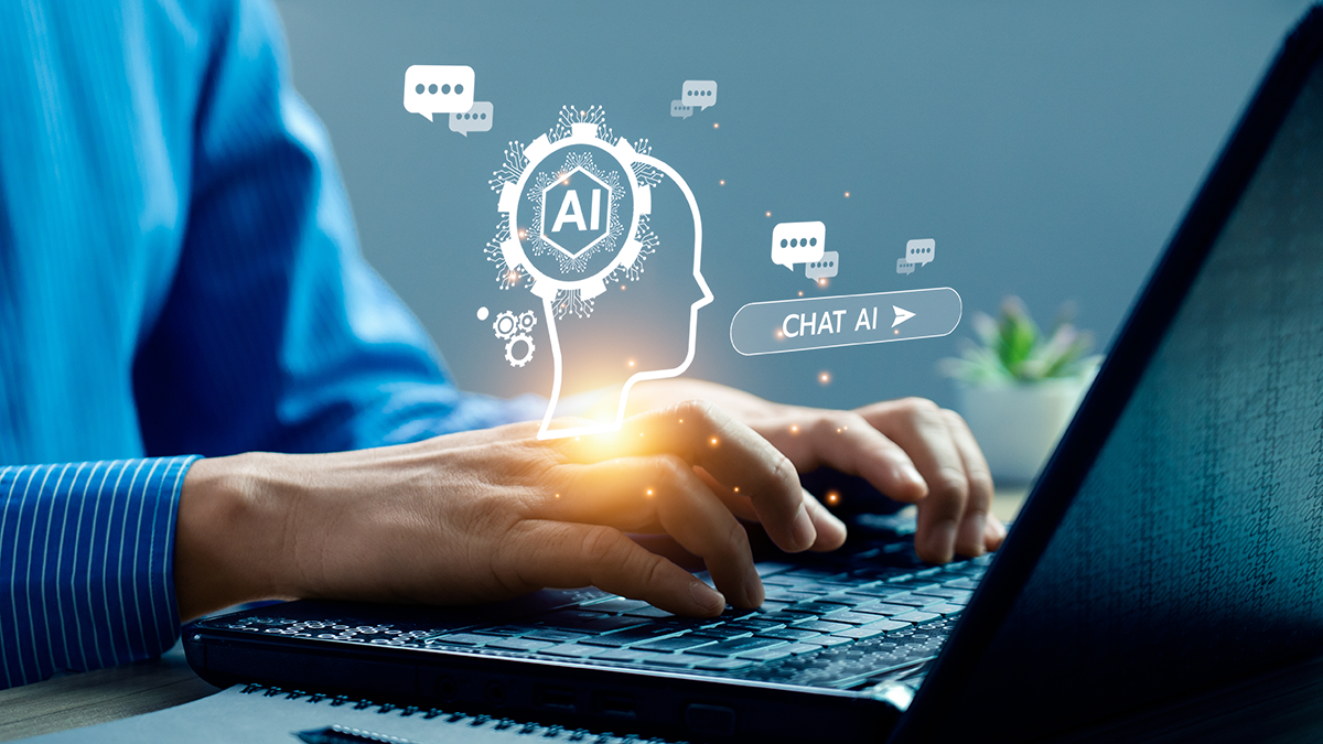 Professional using an AI interface on a laptop